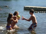 Children playing in lake