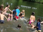 Children playing in lake