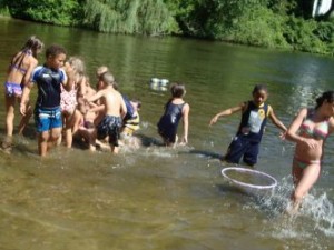 Children playing in lake