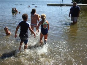 Children playing in lake