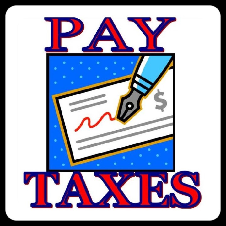 a photo with the words Pay Taxes and a pen writing a signature